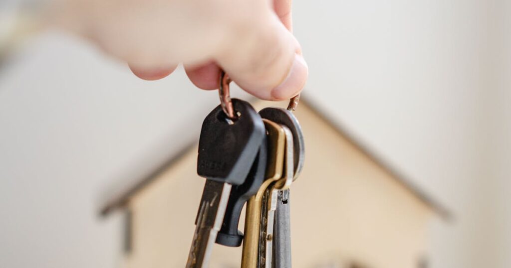 Person holding house keys